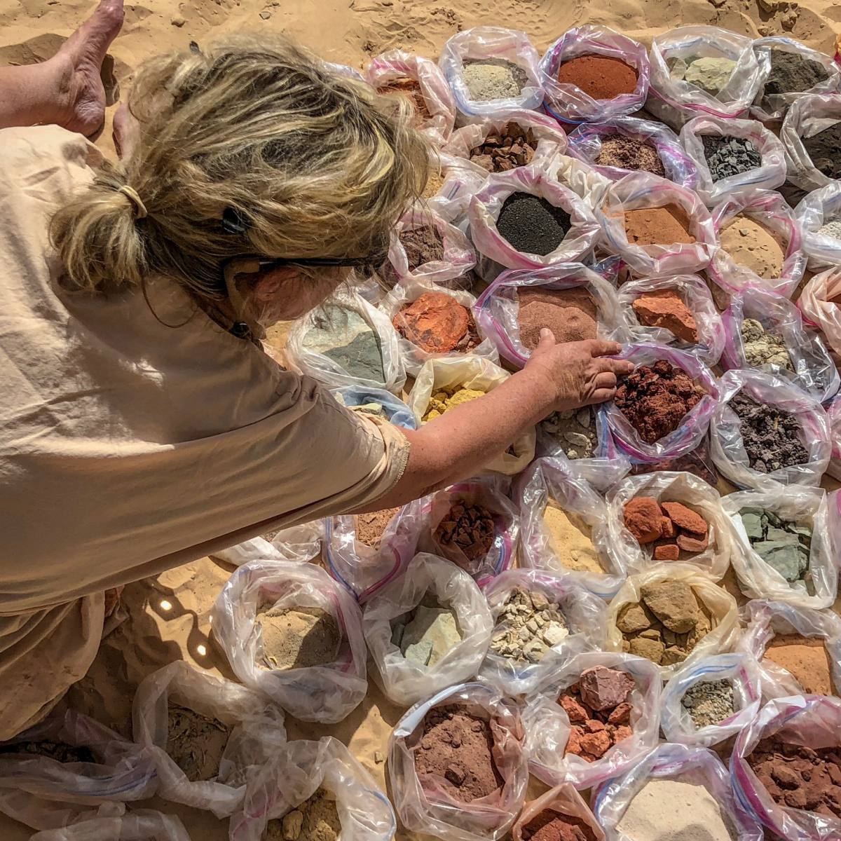 Ulrike at Amanigiri, sorting different Earth Bags